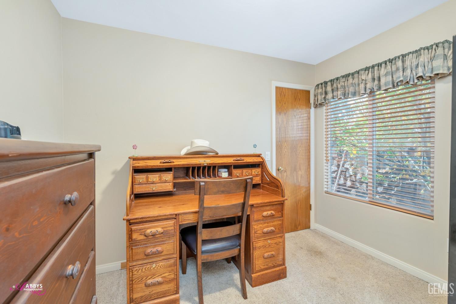 Undisclosed Address Bakersfield, CA 93312 - Photo 21 of 26 a bedroom with a bunk bed and a window