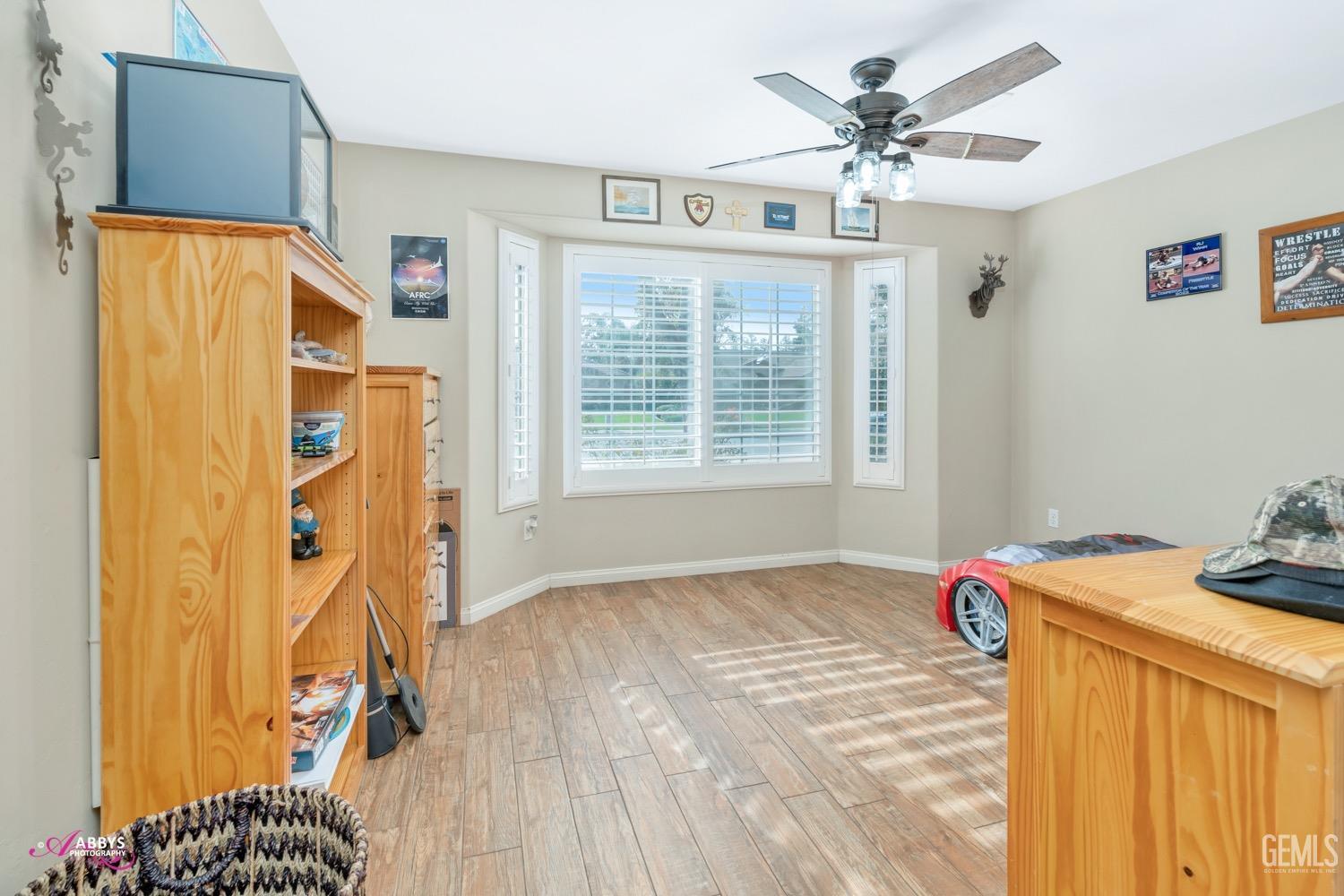 Undisclosed Address Bakersfield, CA 93312 - Photo 22 of 26 a view of an empty room with a window
