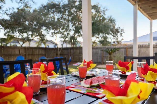 a view of a park with chairs and a table