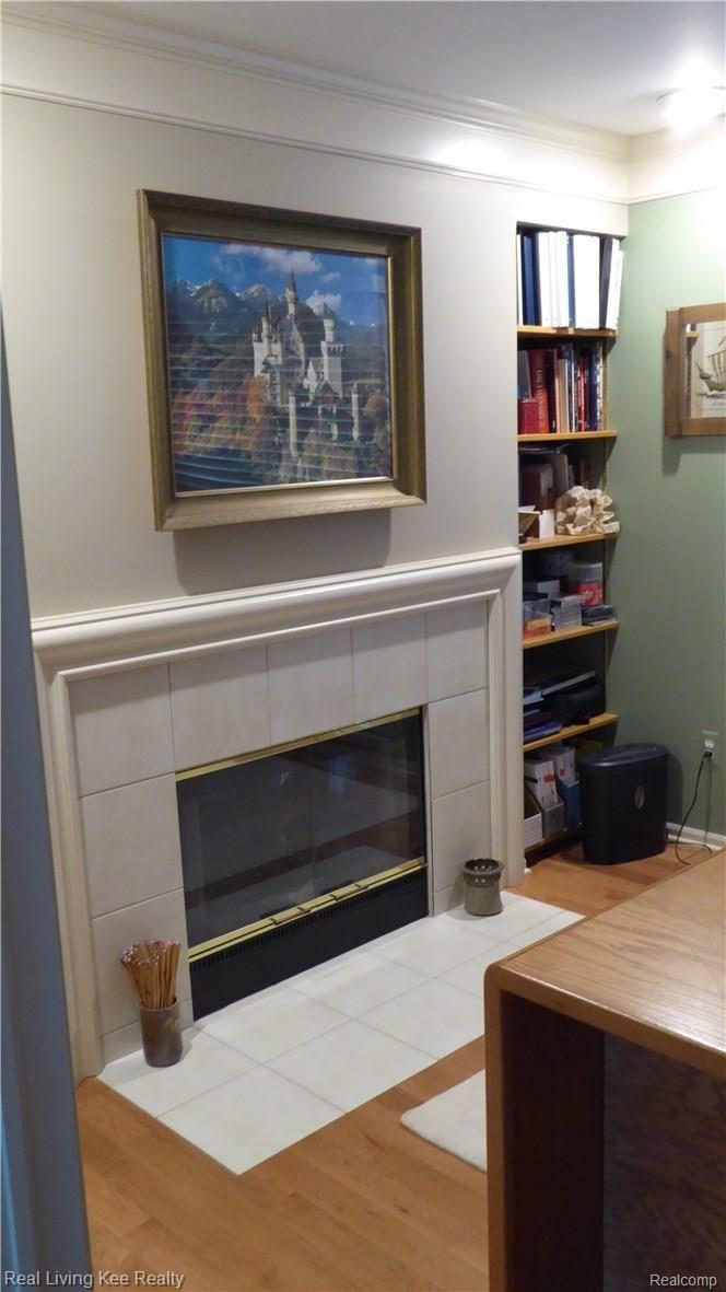 1726 Hillcrest Drive Rochester, MI 48306 - Photo 6 of 38 Wood burning fireplace in den