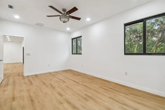 a bathroom with a sink a toilet and bathtub