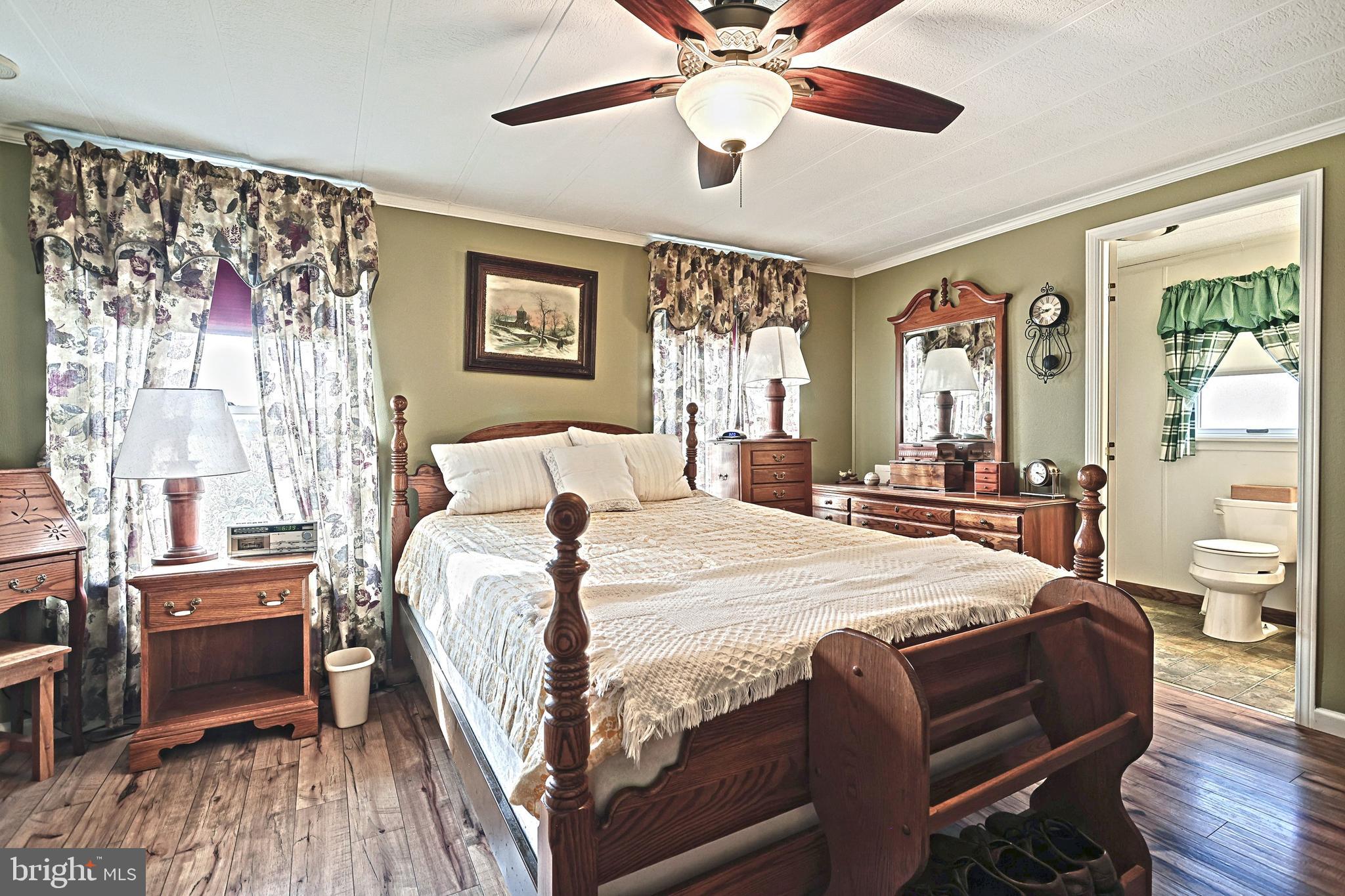 95 Sechrist Flat Road Felton, PA 17322 - Photo 18 of 45 a bedroom with a bed and wooden floor