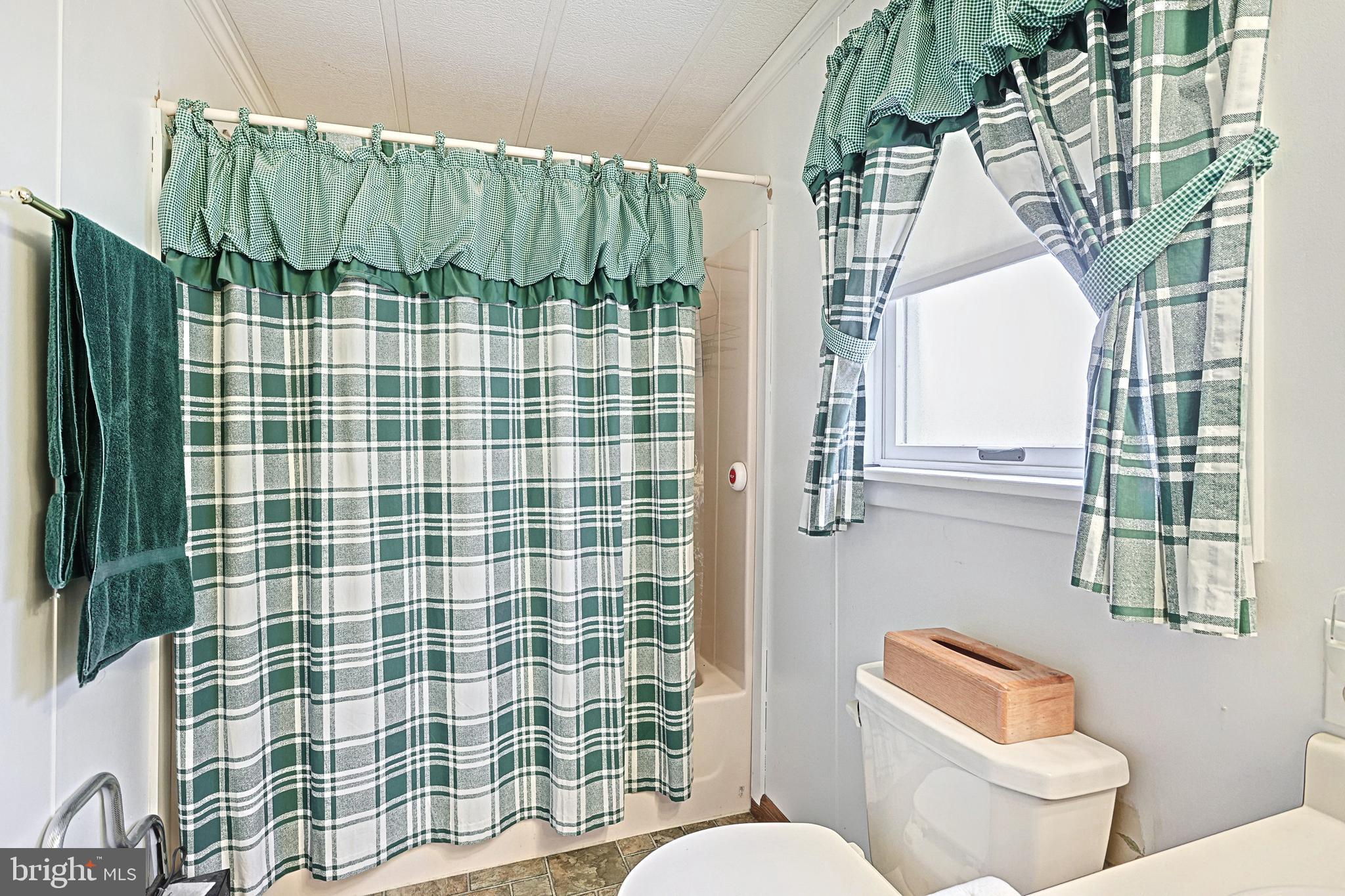 95 Sechrist Flat Road Felton, PA 17322 - Photo 19 of 45 a bathroom with a toilet sink and shower