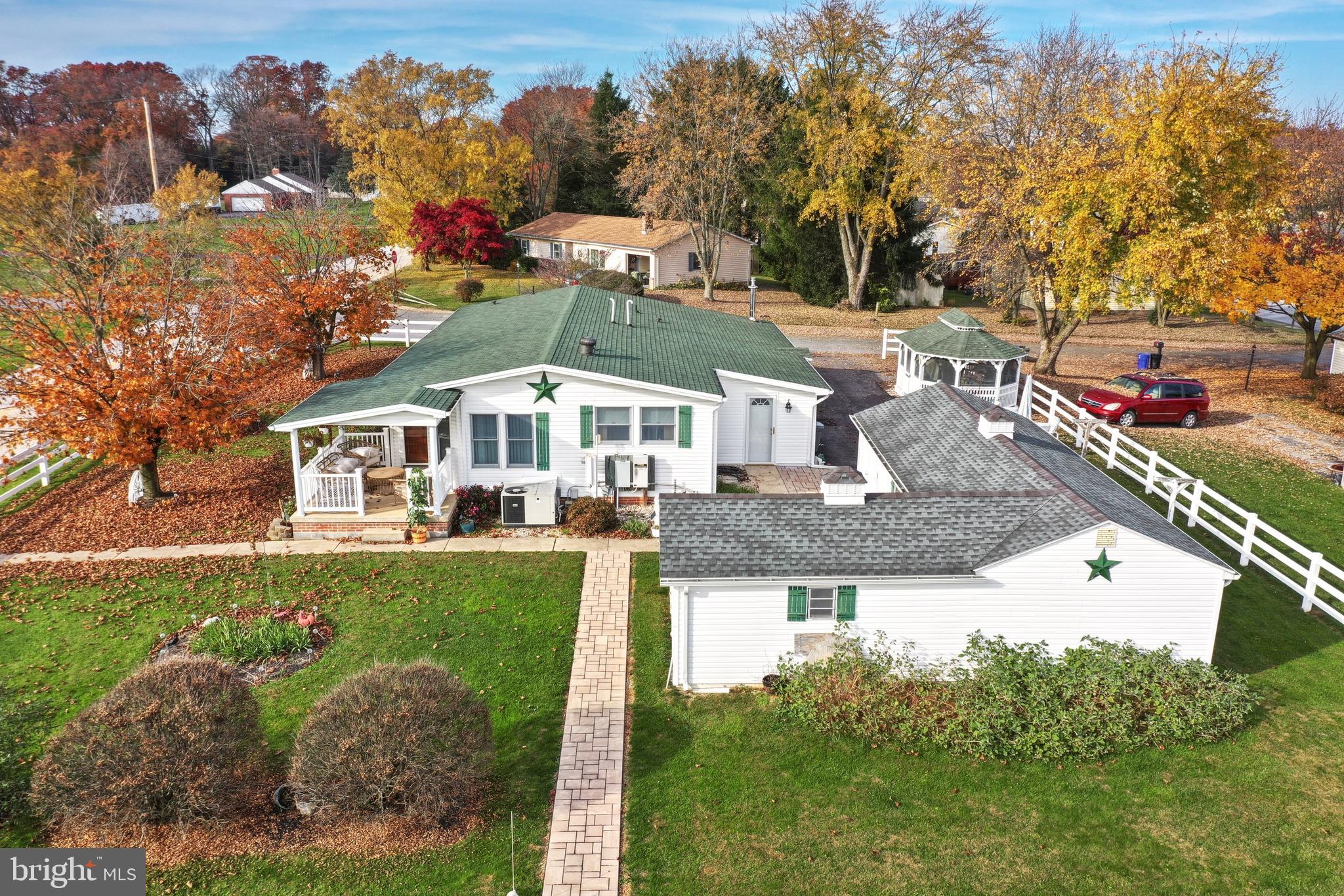 95 Sechrist Flat Road Felton, PA 17322 - Photo 3 of 45 a aerial view of a house with a yard table and chairs