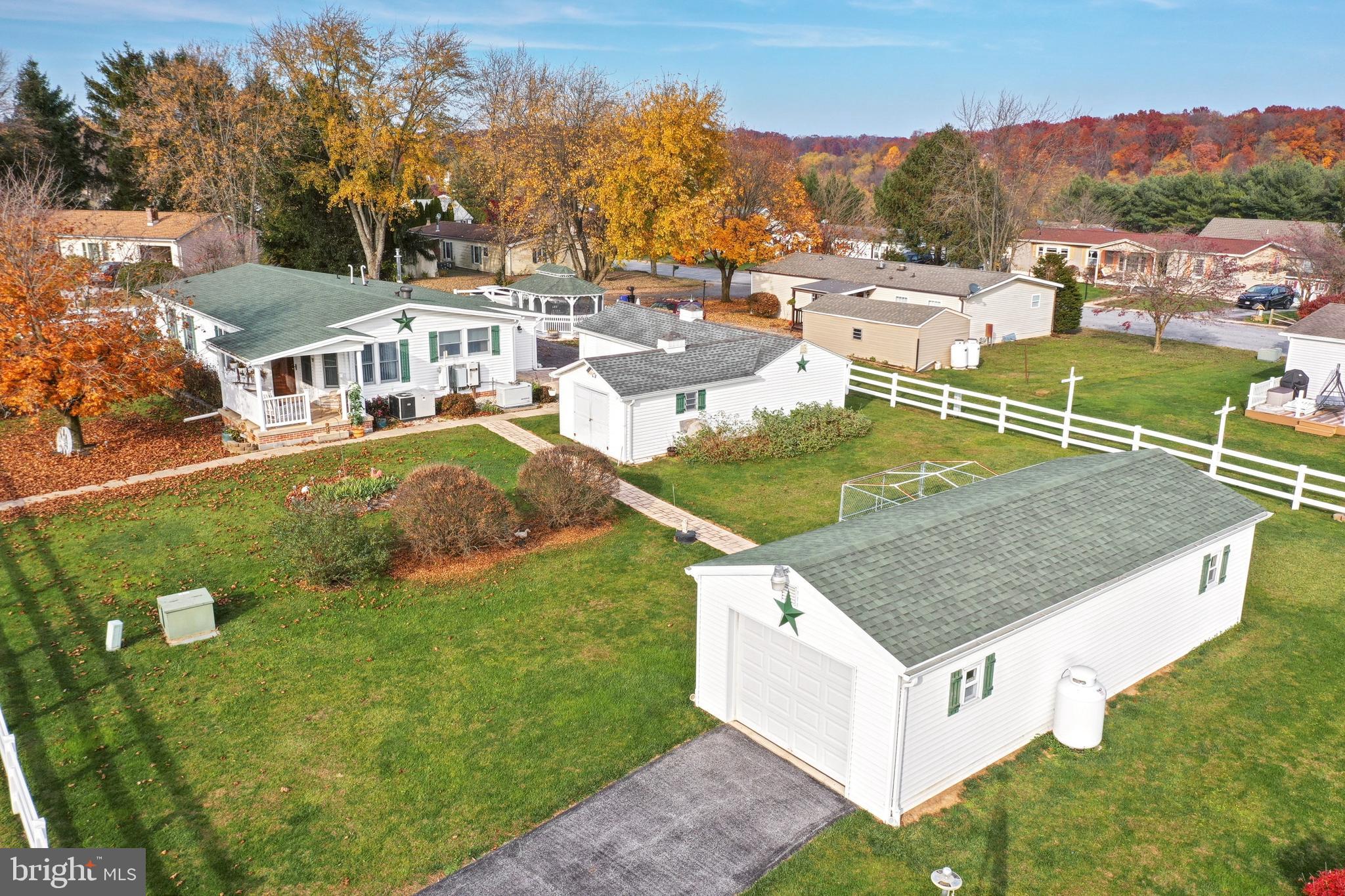 95 Sechrist Flat Road Felton, PA 17322 - Photo 36 of 45 an aerial view of residential houses with outdoor space and trees