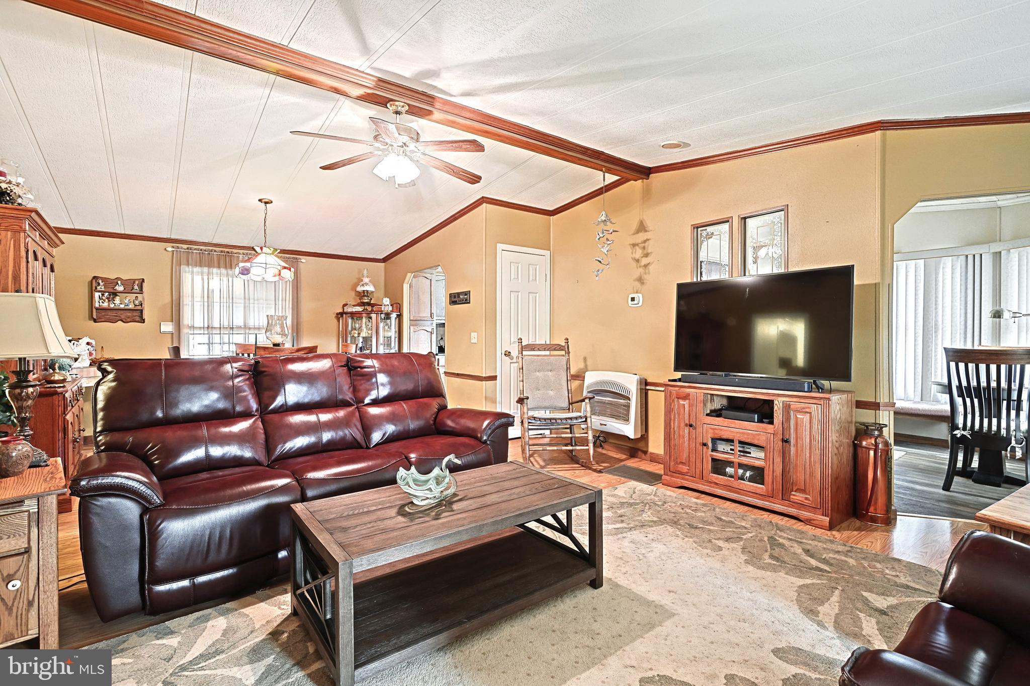 95 Sechrist Flat Road Felton, PA 17322 - Photo 8 of 45 a living room with furniture and a flat screen tv