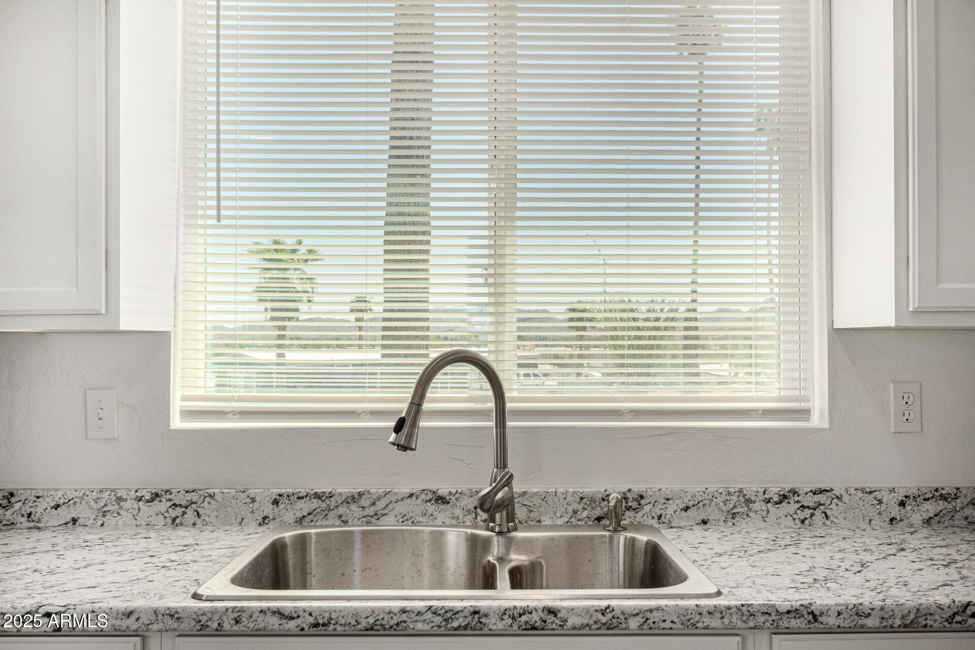 12814 North 19th Place, Unit 19 Phoenix, AZ 85022 - Photo 15 of 29 a close view of a sink and a window