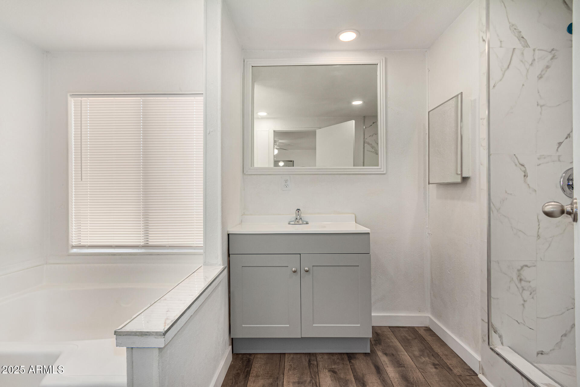 12814 North 19th Place, Unit 19 Phoenix, AZ 85022 - Photo 20 of 29 a bathroom with a sink a toilet and shower