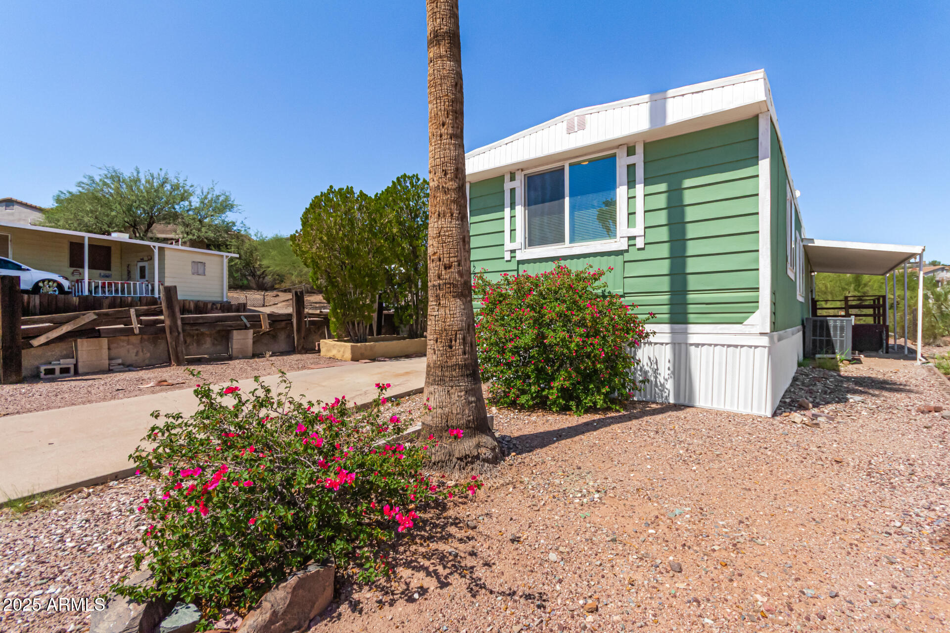 12814 North 19th Place, Unit 19 Phoenix, AZ 85022 - Photo 5 of 29 a view of a garden with sitting area
