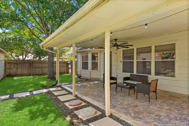 a garden view with a seating space