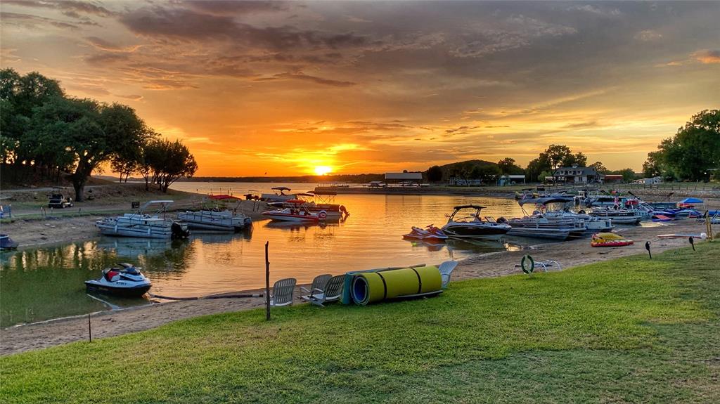 2334 San Bar Road, Unit 50 Graford, TX 76449 - Photo 38 of 40 a view of a lake with outdoor seating