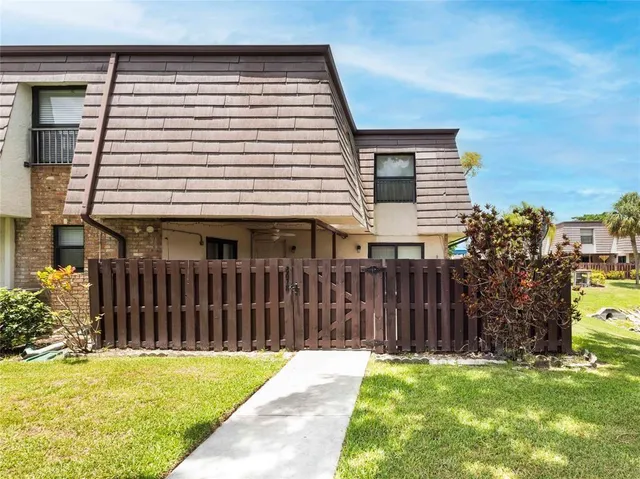 a front view of a house having yard