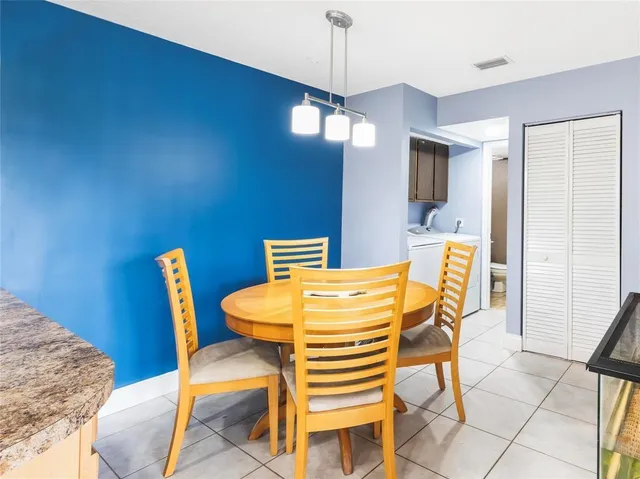 a view of a dining room with furniture