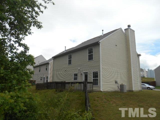 4180 Dalcross Road Raleigh, NC 27610 - Photo 2 of 12 a view of a house with backyard