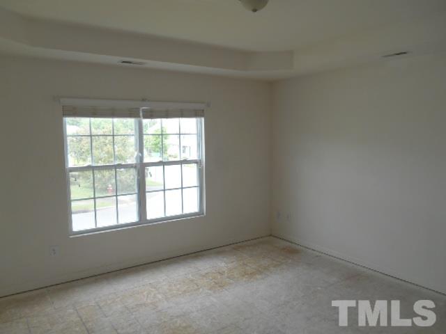 4180 Dalcross Road Raleigh, NC 27610 - Photo 12 of 12 an empty room with a window