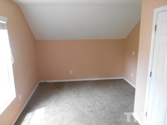 4180 Dalcross Road Raleigh, NC 27610 - Photo 7 of 12 a view of an empty room