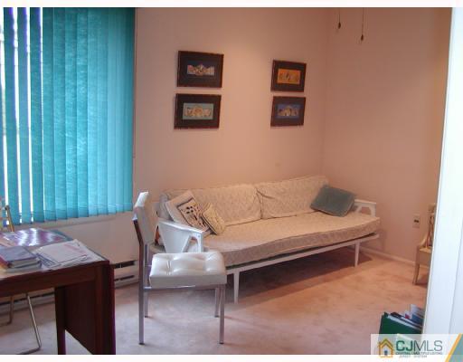 735 B Prospect Road Monroe Township, NJ 08831 - Photo 6 of 8 a living room with furniture and a window