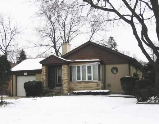 1237 South Fairview Avenue Park Ridge, IL 60068 - Photo 1 of 1 a front view of a house with yard and covered with snow
