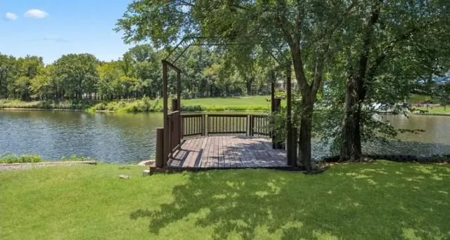 a view of a backyard with a fountain