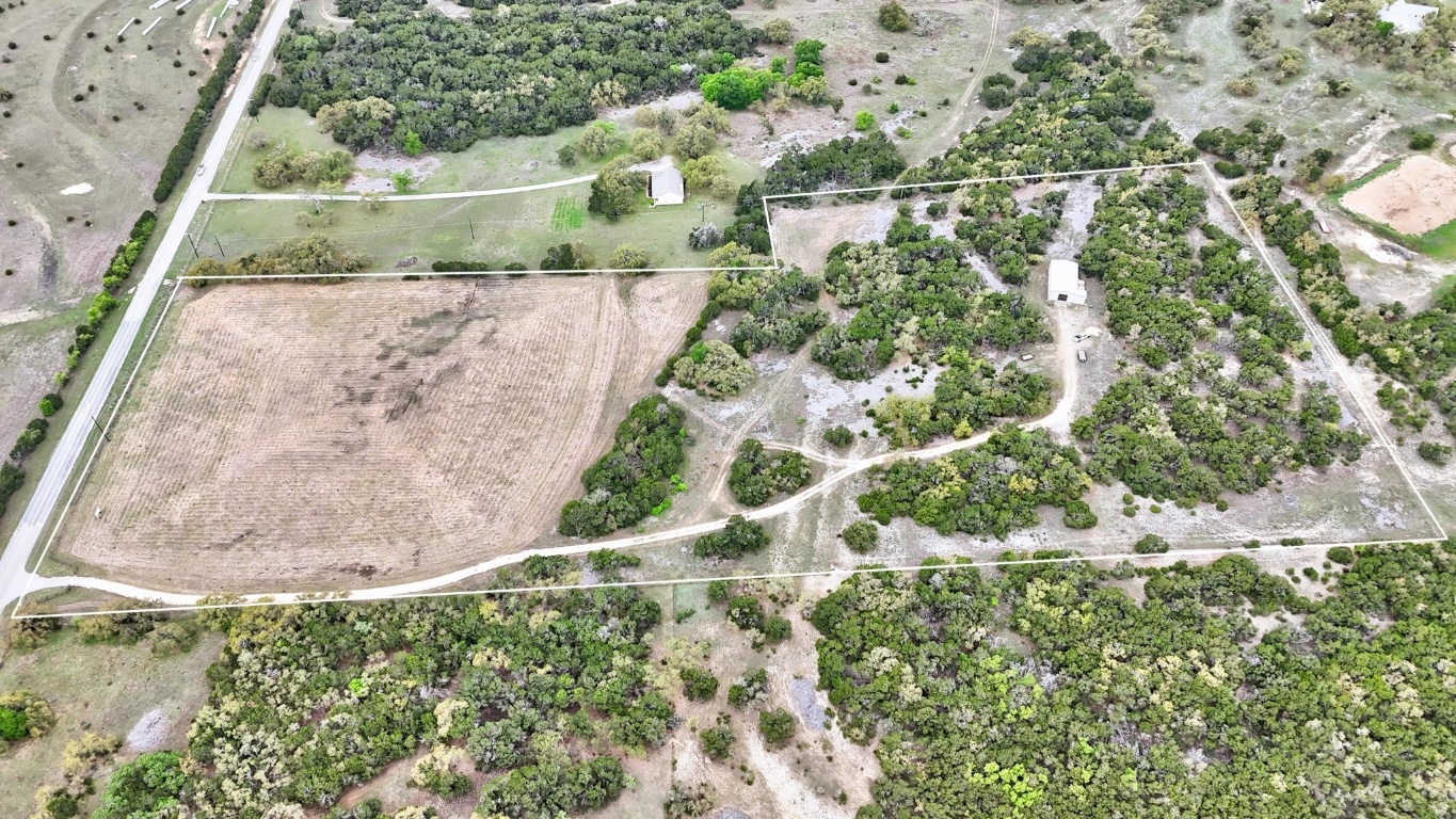 10750 Darden Hill Road Austin, TX 78737 - Photo 12 of 16 a view of a yard with plants