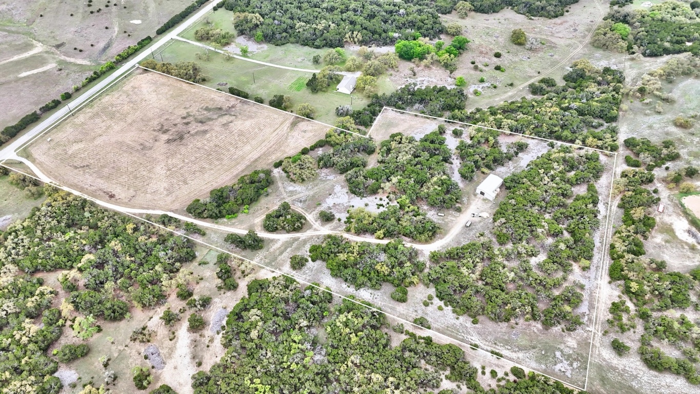 10750 Darden Hill Road Austin, TX 78737 - Photo 13 of 16 a view of a tree with a yard