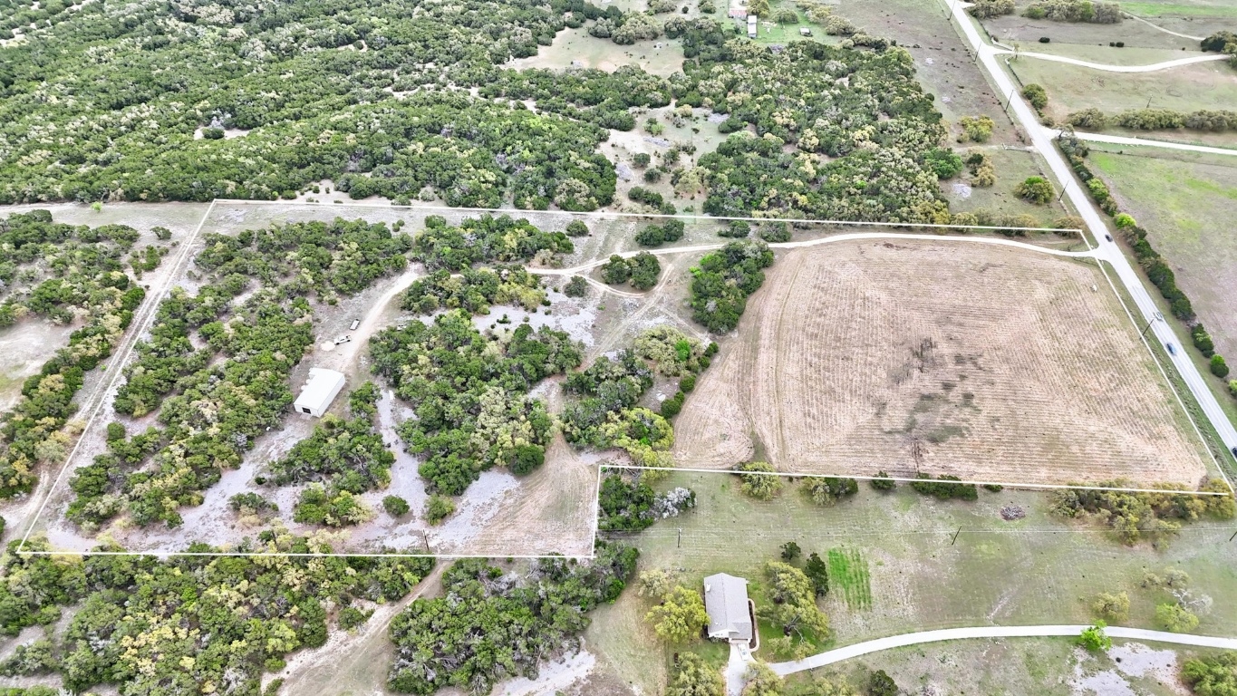 10750 Darden Hill Road Austin, TX 78737 - Photo 16 of 16 a view of swimming pool with a yard