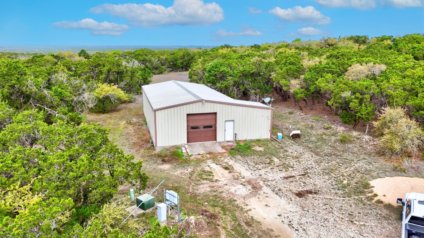 10750 Darden Hill Road Austin, TX 78737 - Photo 5 of 16 a view of a backyard