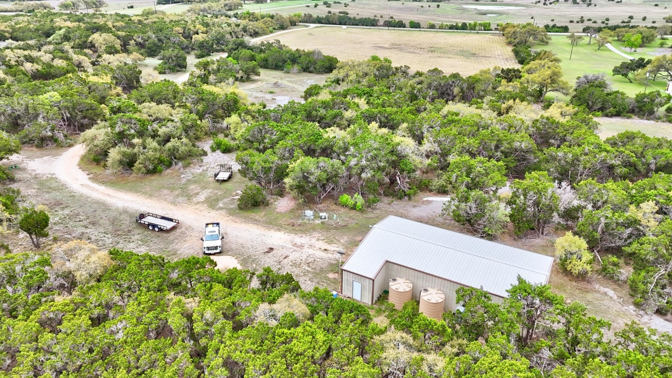 10750 Darden Hill Road Austin, TX 78737 - Photo 8 of 16 an aerial view of a house with a yard and lake view