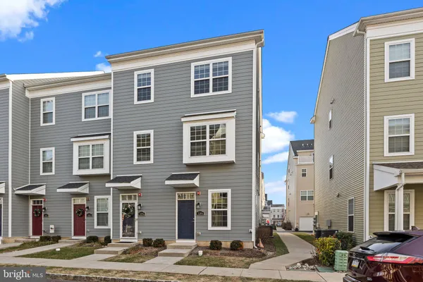 a front view of a building with street view