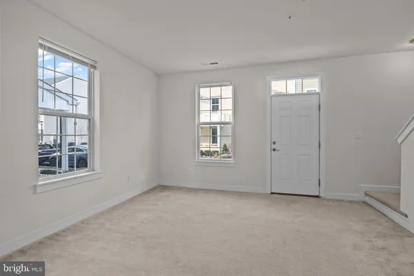 a bathroom with a sink toilet and a mirror