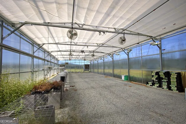 a view of a room with wooden walls