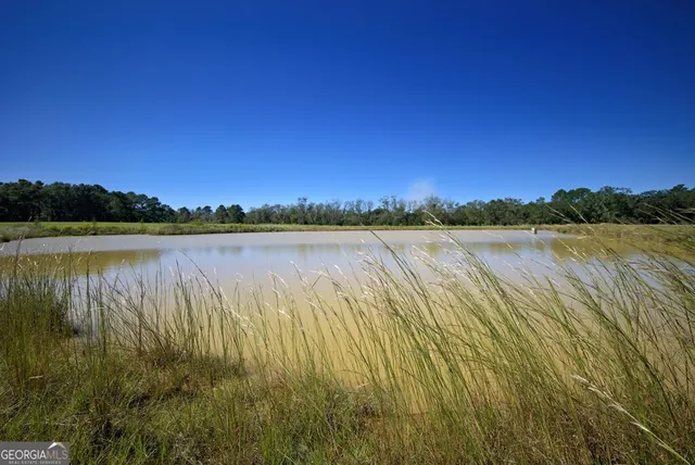 a view of lake and sunset