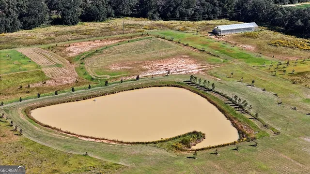 a view of swimming pool with a yard