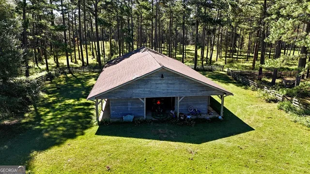 a view of house with yard