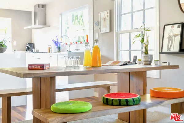 a kitchen with a sink and a stove
