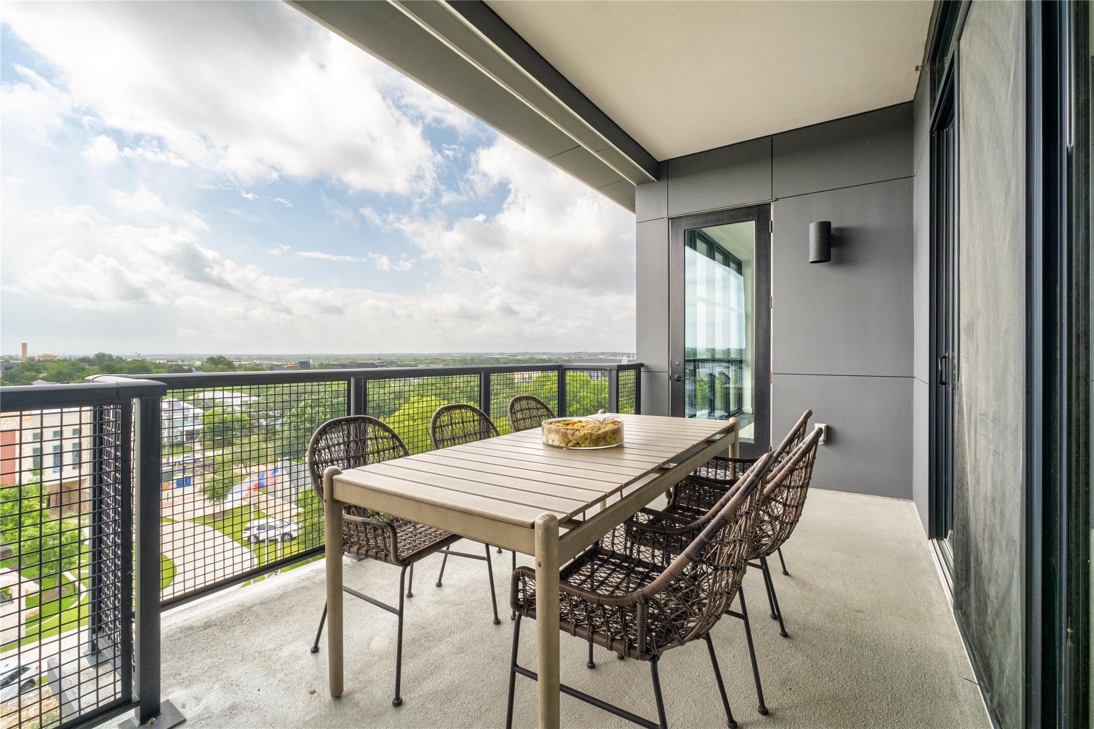800 Embassy Drive, Unit 602 Austin, TX 78702 - Photo 20 of 37 a view of a patio with a table and chairs