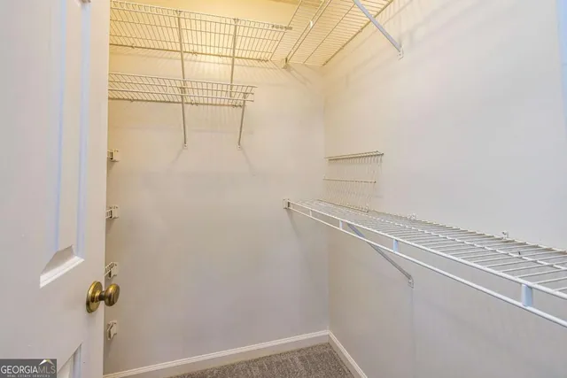 a view of a room with racks on the wall