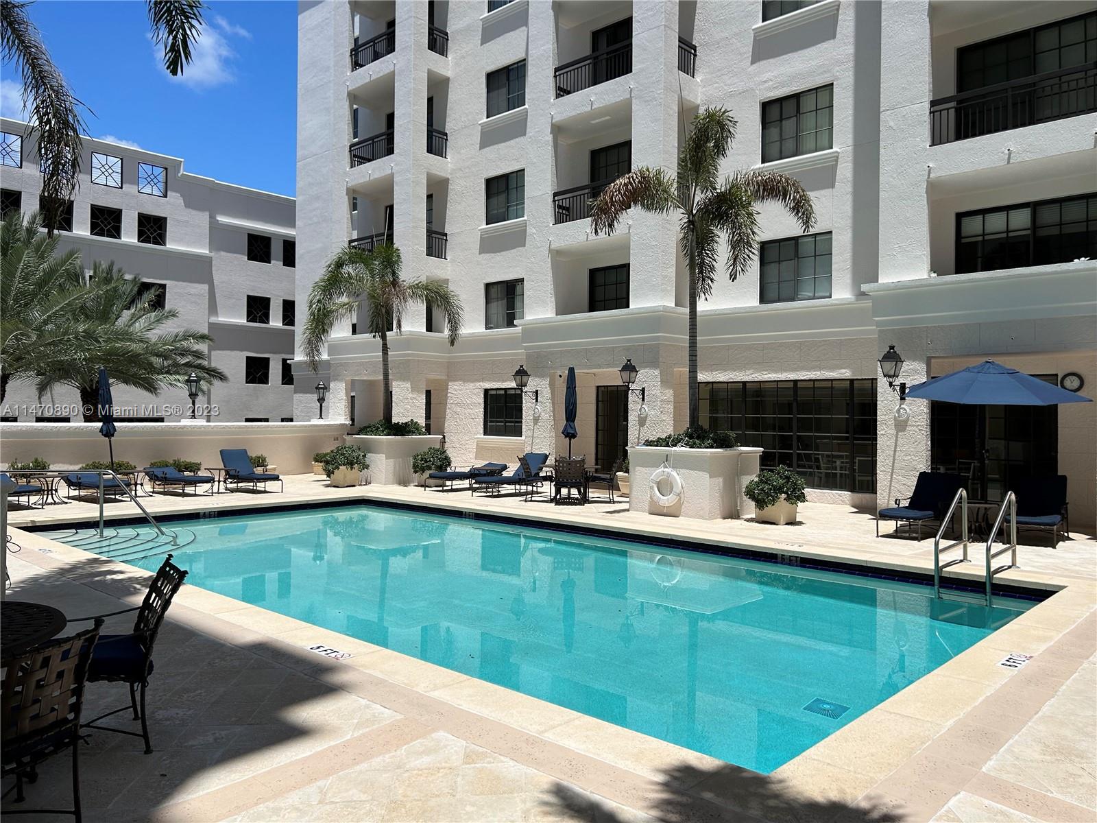 233 South Federal Highway, Unit 609 Boca Raton, FL 33432 - Photo 18 of 24 a view of a swimming pool with outdoor seating space