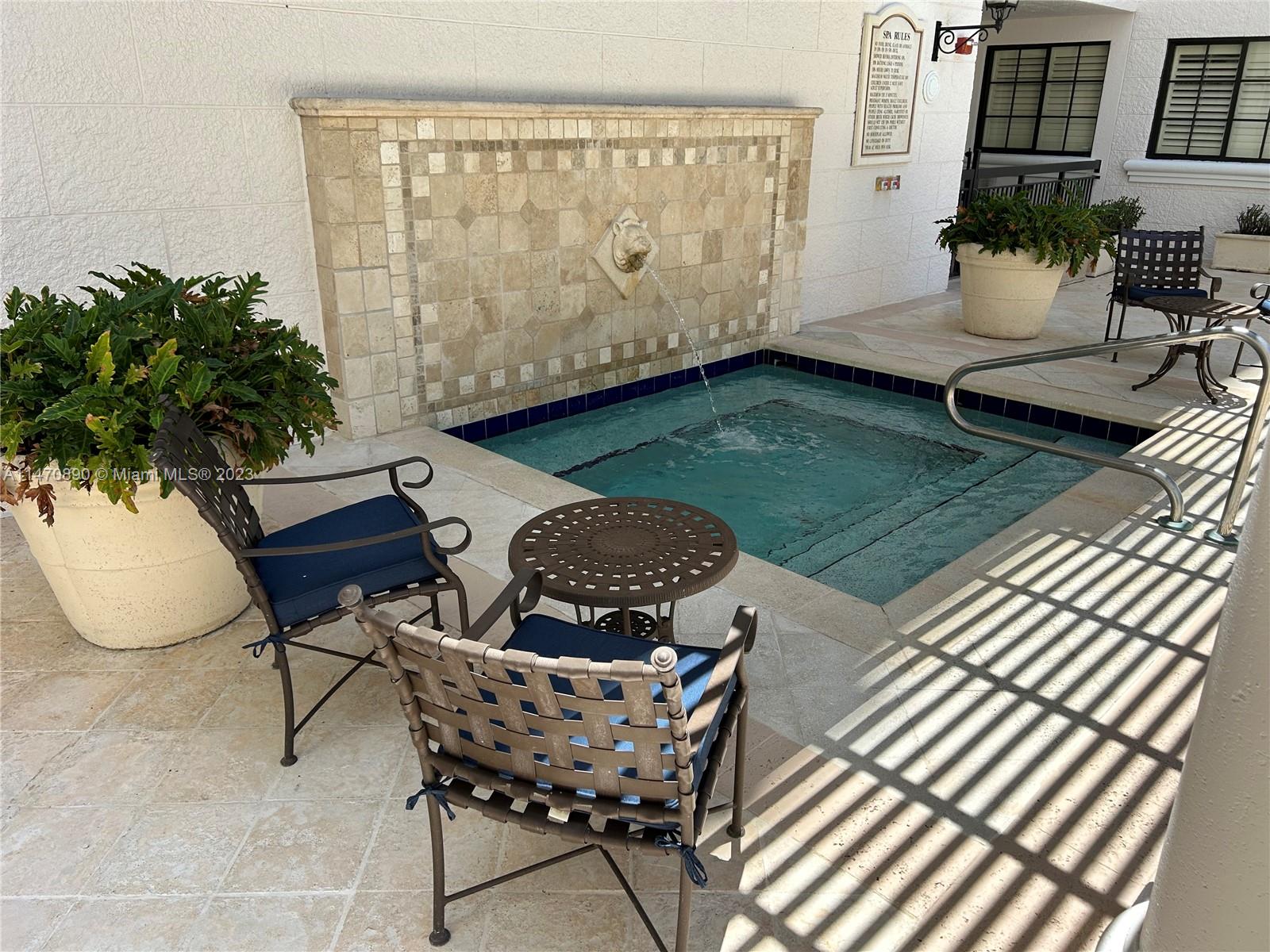 233 South Federal Highway, Unit 609 Boca Raton, FL 33432 - Photo 19 of 24 a outdoor living space with furniture and garden view
