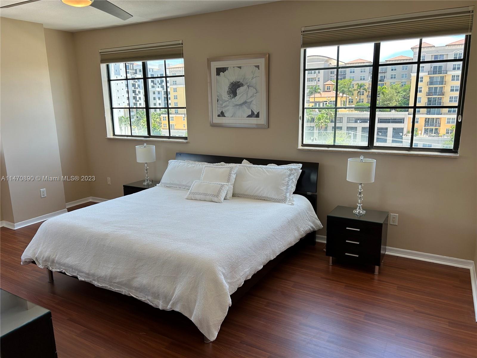 233 South Federal Highway, Unit 609 Boca Raton, FL 33432 - Photo 9 of 24 a bedroom with a bed and a window