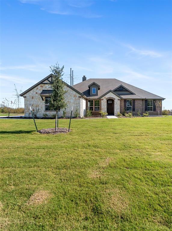 30 Roosevelt Ln Valley View Valley View, TX 76272 - Photo 3 of 35 View of front of house featuring a front lawn and a chimney
