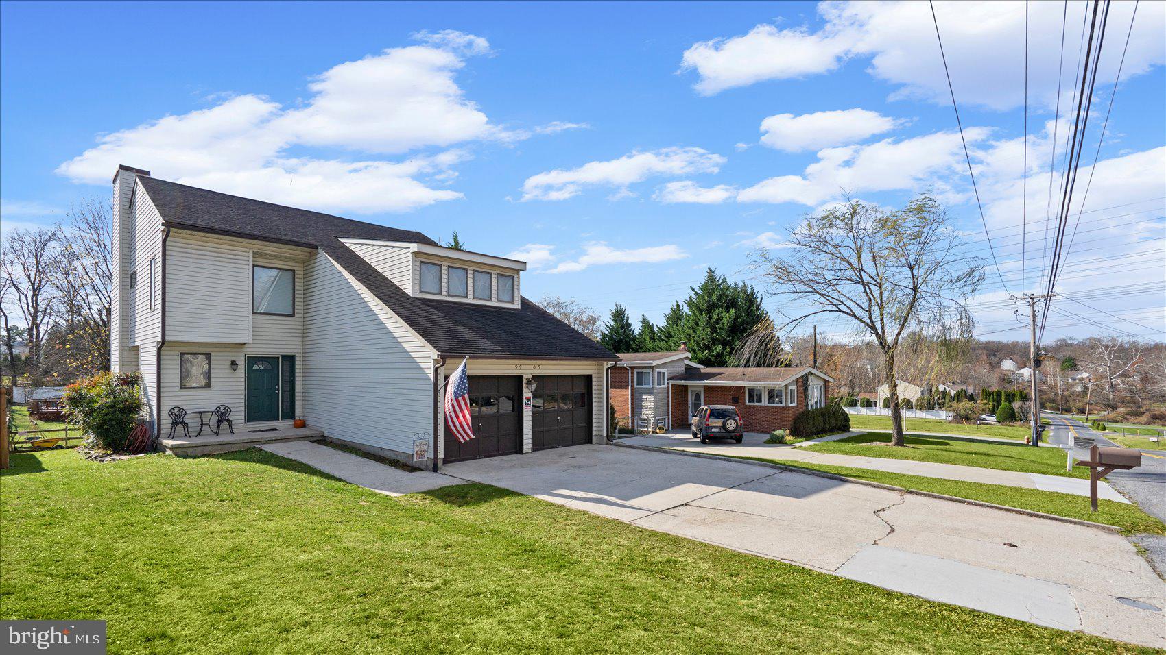 9905 Magledt Road Baltimore, MD 21234 - Photo 2 of 45 a view of a house with a yard