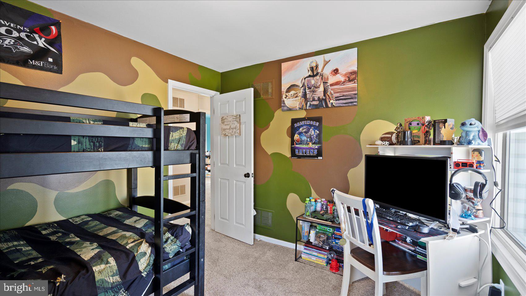 9905 Magledt Road Baltimore, MD 21234 - Photo 31 of 45 a bedroom with a bed and a closet