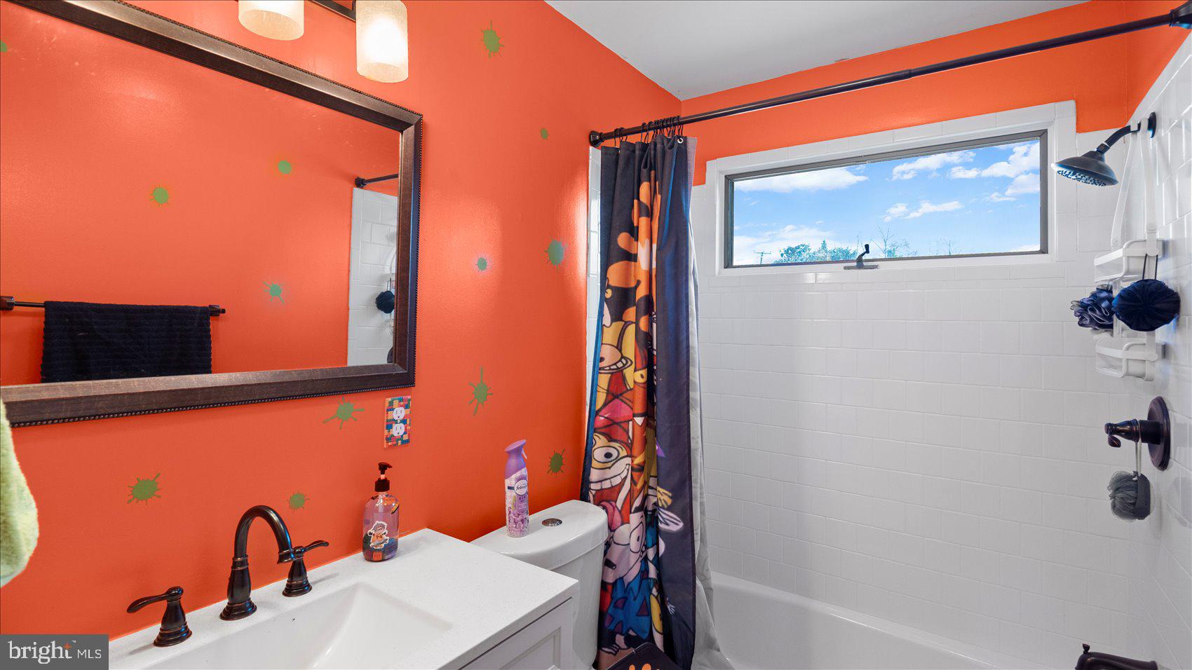 9905 Magledt Road Baltimore, MD 21234 - Photo 33 of 45 a bathroom with a sink and a mirror