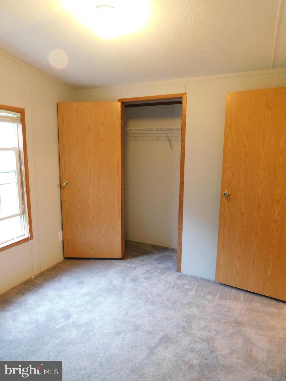 135 Sharp Road Avondale, PA 19311 - Photo 14 of 27 an empty room with windows