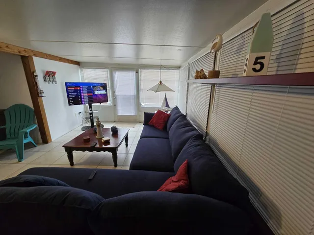 a living room with furniture and a couch