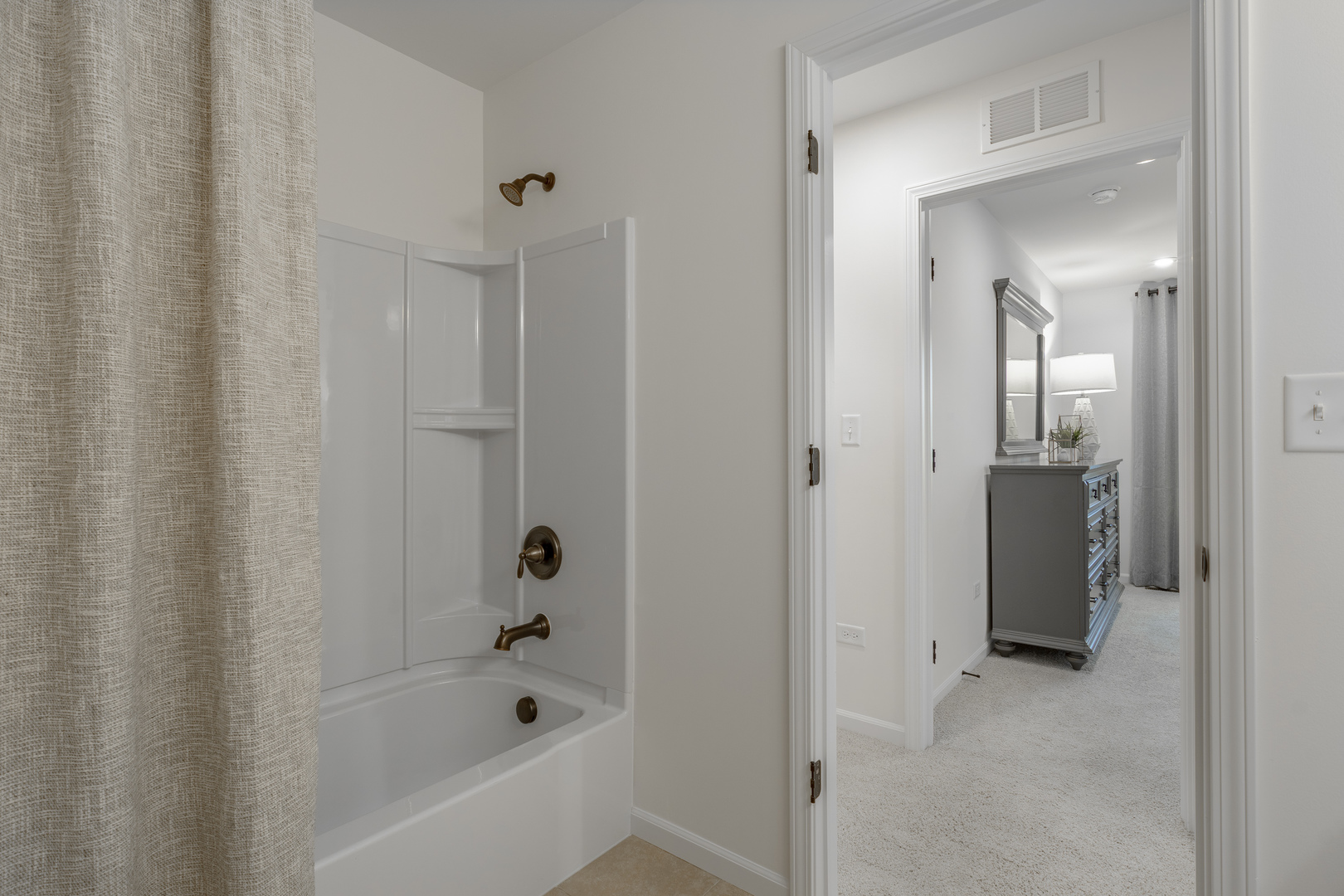 1270 Driscoll Lane Addison, IL 60101 - Photo 19 of 25 a bathroom with a bathtub and shower