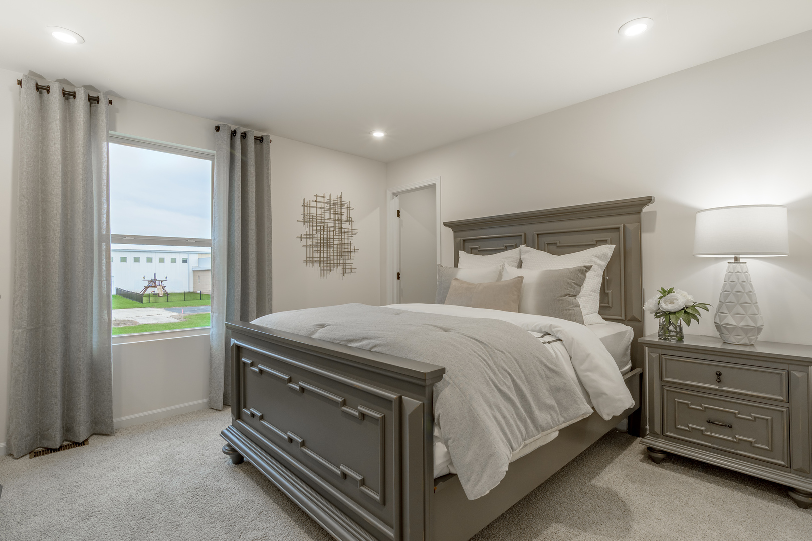 1270 Driscoll Lane Addison, IL 60101 - Photo 21 of 25 a bedroom with a bed and a window