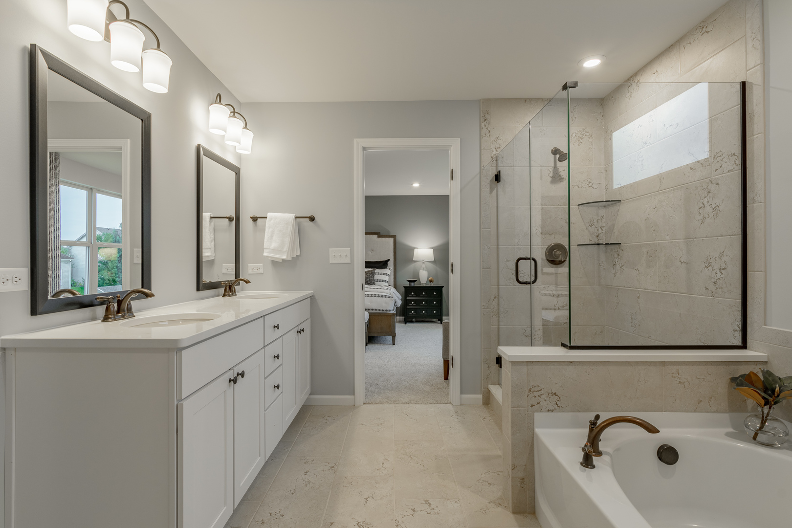 1270 Driscoll Lane Addison, IL 60101 - Photo 25 of 25 a bathroom with a double vanity sink mirror and shower
