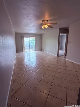 a view of a livingroom with a fan